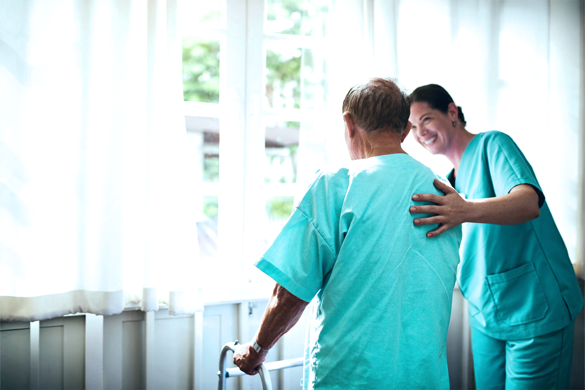 Healthcare caregiver with patient